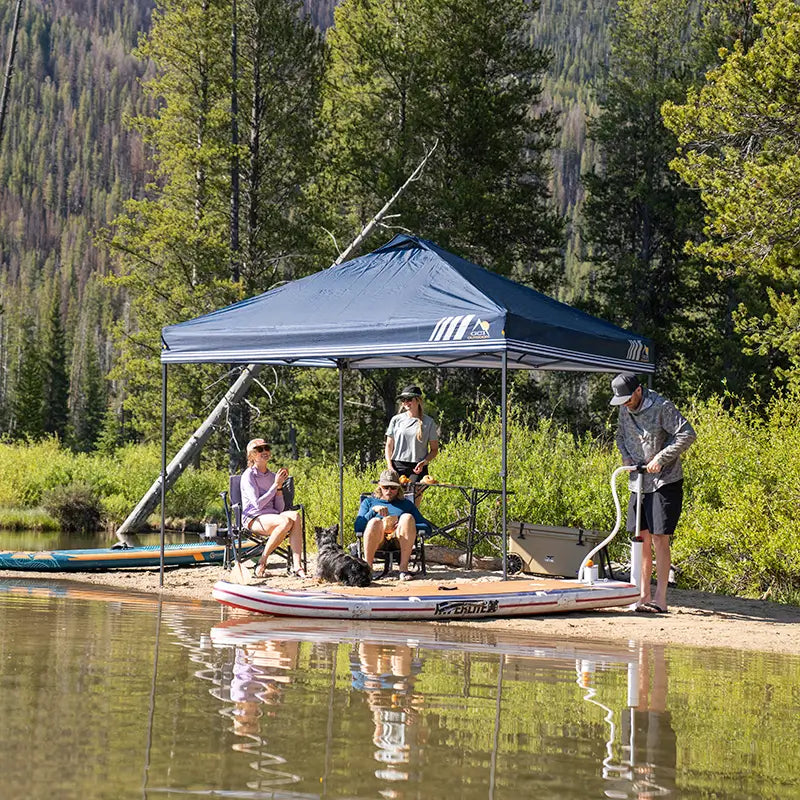 A group of kayakers hanging out on a sandbar underneath a Levrup Canopy. 