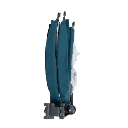 A teal Sunshade Accessory folded up.